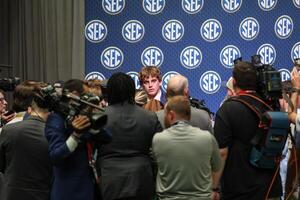 Texas Longhorns quarterback Arch Manning answers questions from the media during SEC Media Days at Omni Atlanta Hotel. editorial_image