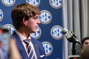 Texas Longhorns quarterback Arch Manning answers questions from the media during SEC Media Days at Omni Atlanta Hotel. editorial_image