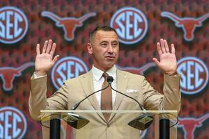 Texas Longhorns head coach Steve Sarkisan talks to the media during SEC Media Days at Omni Atlanta Hotel. editorial_image