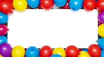 A white frame surrounded by colorful balloons photo