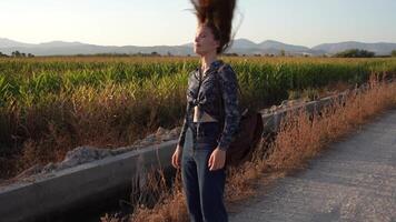 A Girl in Nature Capturing an Exquisite and Serene Moment While Surrounded by the Fields video