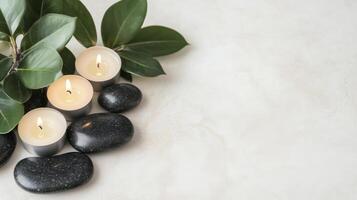 Spa stones and candles on a white background photo