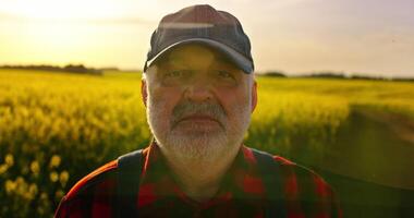 Portrait Of Professional Agronomist Or Old Farmer In Agricultural Field, Close Up Of Aged Male Face video