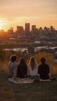 Four friends enjoying tranquil sunset view over city skyline from grassy hill. They share happy moment together, silhouette against warm golden light, experiencing peaceful connection and freedom photo