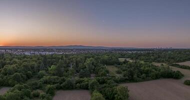 Drone timelapse of Frankfurt skyline and airport at sunset video