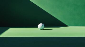 golf ball on green surface with shadow photo