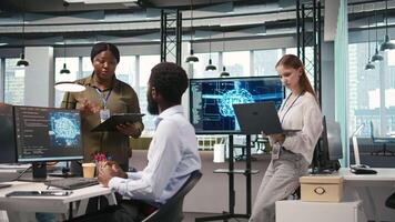 Junior developer utilizing artificial intelligence to optimize performance and forecast issues. Young female engineer in office training machine learning models, camera A video