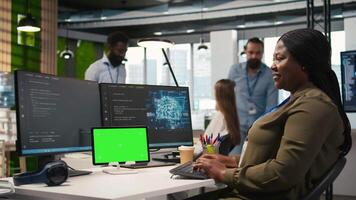 Admin using isolated screen tablet to code AI algorithms debugging software issues and improving system stability. Tech startup office worker using chroma key device, configuring settings, camera A video