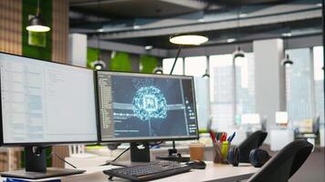 PC on office desk used to design and implement algorithms enabling deep learning. Artificial intelligence technology company workspace with computer used to conduct code reviews to fix bugs video