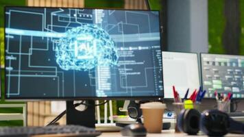 PC in startup office used to design and implement algorithms enabling machine learning. Technology unicorn venture workspace with computer used to conduct code reviews to fix bugs video