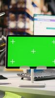 Vertical Empty warehouse space shows isolated chroma key display on pc, managing order processing and shipping e-commerce cargo goods. Storage room with racks and packages on shelves. video