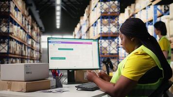 Warehouse supply and demand operations for package tracking, checking shipment details for fast delivery service. Handling merchandise registration for inventory control in big depot. Camera A. video