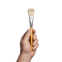 Close-up of hand holding a paintbrush on a transparent background, showcasing creativity and art supplies for painting projects and artistic expression. png