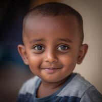 Portrait of a Young Boy with a Sweet Smile. His expressive eyes and gentle expression create a heartwarming image. photo