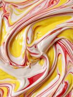 Abstract Swirls of Creamy Yellow Red and White Paint Close Up Texture Background. photo