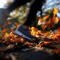 Running Through Autumn Leaves A Motion Blur Image of a Person Jogging. photo