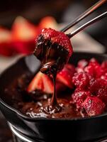 Delicious Chocolate Fondue with Strawberries and Raspberries A Close Up. photo