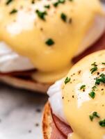 Close Up of Eggs Benedict Delicious Poached Eggs with Hollandaise Sauce. photo