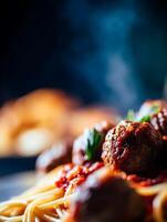 Close up of Delicious Spaghetti and Meatballs with Steaming Sauce. photo