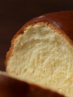 Close Up of a Crusty Bread Loaf, Showing its Soft Interior. photo