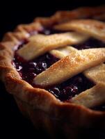 Close up of a delicious homemade berry pie with a lattice crust, perfect for dessert or baking blogs. photo