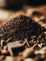 Close up of Aromatic Spices and Dark Chocolate Pieces. A Detailed Image of Ground Coffee Beans, Cardamom, and Cinnamon. photo