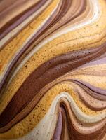 Close Up of Swirled Brown, Beige, and White Creamy Substance. A Detailed Macro Photograph of Textured Confectionery. photo