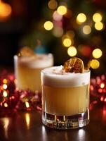 Festive Cocktail in a Rocks Glass with Christmas Lights Bokeh. A delicious winter drink garnished with dried orange and cinnamon. photo