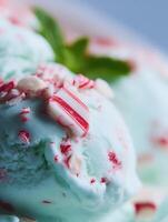 Close Up of Mint Chocolate Chip Ice Cream with Candy Cane Pieces. photo