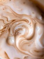 Abstract Swirling Coffee Cream Close Up, Coffee Texture Background. photo