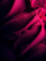 Close up of Deep Pink Ice Cream Texture, Swirling and Creamy Dessert. photo