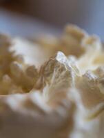 Close Up of Creamy Whipped Cream Texture, Delicious Dessert Background. photo