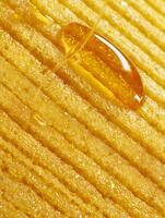 Golden Honey Drizzled Over Crispy, Sweet Treats A Close Up Food Photography. photo