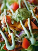 Close Up of Delicious Nachos with Guacamole and Sour Cream. photo