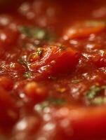 Close Up of Homemade Tomato Sauce with Fresh Herbs. A detailed image showcasing the texture and vibrant color of freshly made tomato sauce. photo