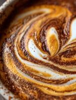 Close Up of Latte Art Swirling Coffee Cream Design. photo