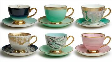 Elegant tea cups and saucers set on white background showcasing vintage designs and vibrant colors photo
