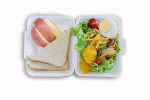 Takeaway food container box mockup with bread, vegetable and fruit isolate on white background. photo