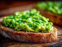 Avocado toast breakfast with herbs on a dark wooden table photo