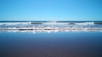 Serene Coastal Scene Ocean Waves Reflecting on a Tranquil Beach. photo