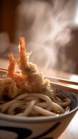Close up of steaming hot udon noodles with tempura shrimp. photo