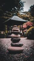 Serene Stone Stack in a Tranquil Japanese Garden. photo