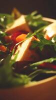 Close Up of Delicious Tofu Salad with Fresh Greens and Vegetables. photo