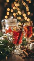 Festive Mulled Wine in Crystal Glass with Cinnamon Sticks and Star Anise. A warm and inviting Christmas beverage. photo