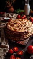 A Stack of Golden Brown Parathas, Close Up Food Photography. photo