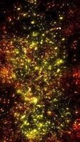Bright golden embers of sparks swirl and fly into space. video