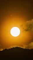 Sun setting at a mountain. video