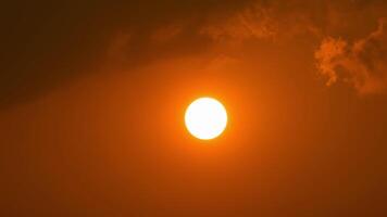 The sun is seen in the sky with clouds video