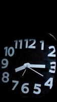 Time lapse of a clock with a black background video