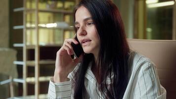 Caucasian woman business worker in office talk mobile phone call businesswoman girl sad dissatisfied talking cellphone conversation female manager designer employee chatting communicate smartphone video